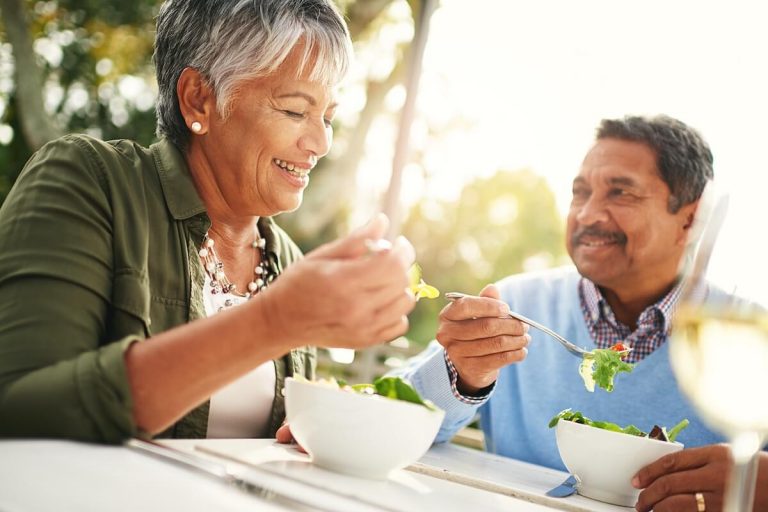 What Are the 8 Dimensions of Wellness? | Sunscape Boca Raton Healthiness and happiness go hand in hand Shot of a happy older couple enjoying a healthy lunch together outdoors