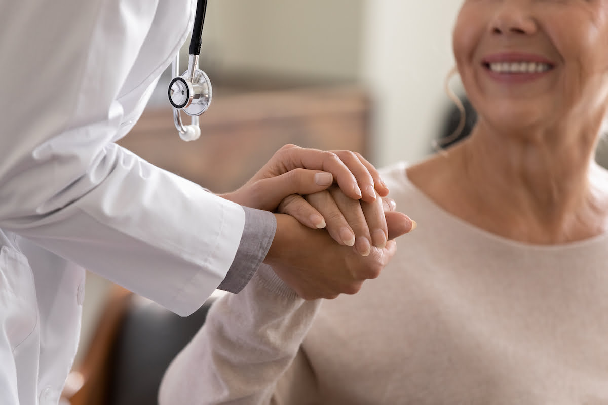 6 Tips for Productive Physician Visits | Sunscape Boca Raton Senior Woman is Greeted by Doctor_Senior Living in Boca Raton