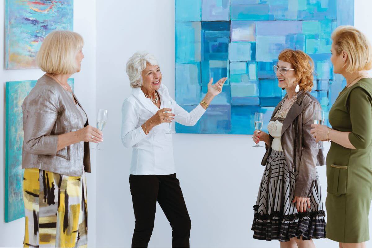 seniors looking at art expression of art show walk to end alzheimers