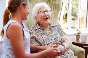 The Truth About What Causes Memory Loss Older woman laughing with a kid