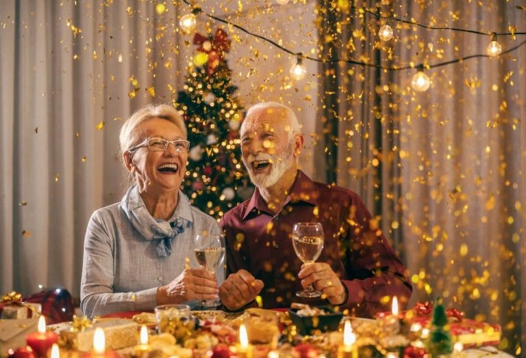 Celebrating the Season with Your Family Member Couple of seniors enjoying the holidays.