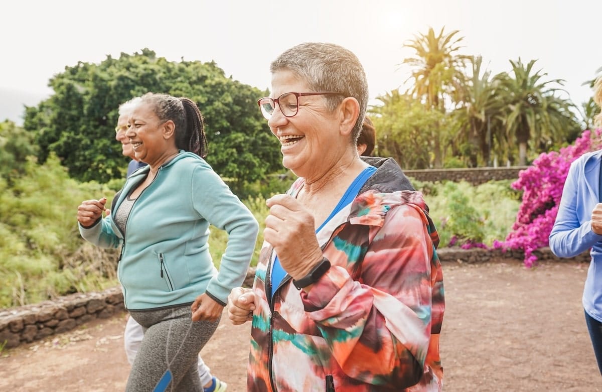 Empowered older adults walking together.