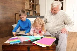Grandparent bonding with his grandchildren