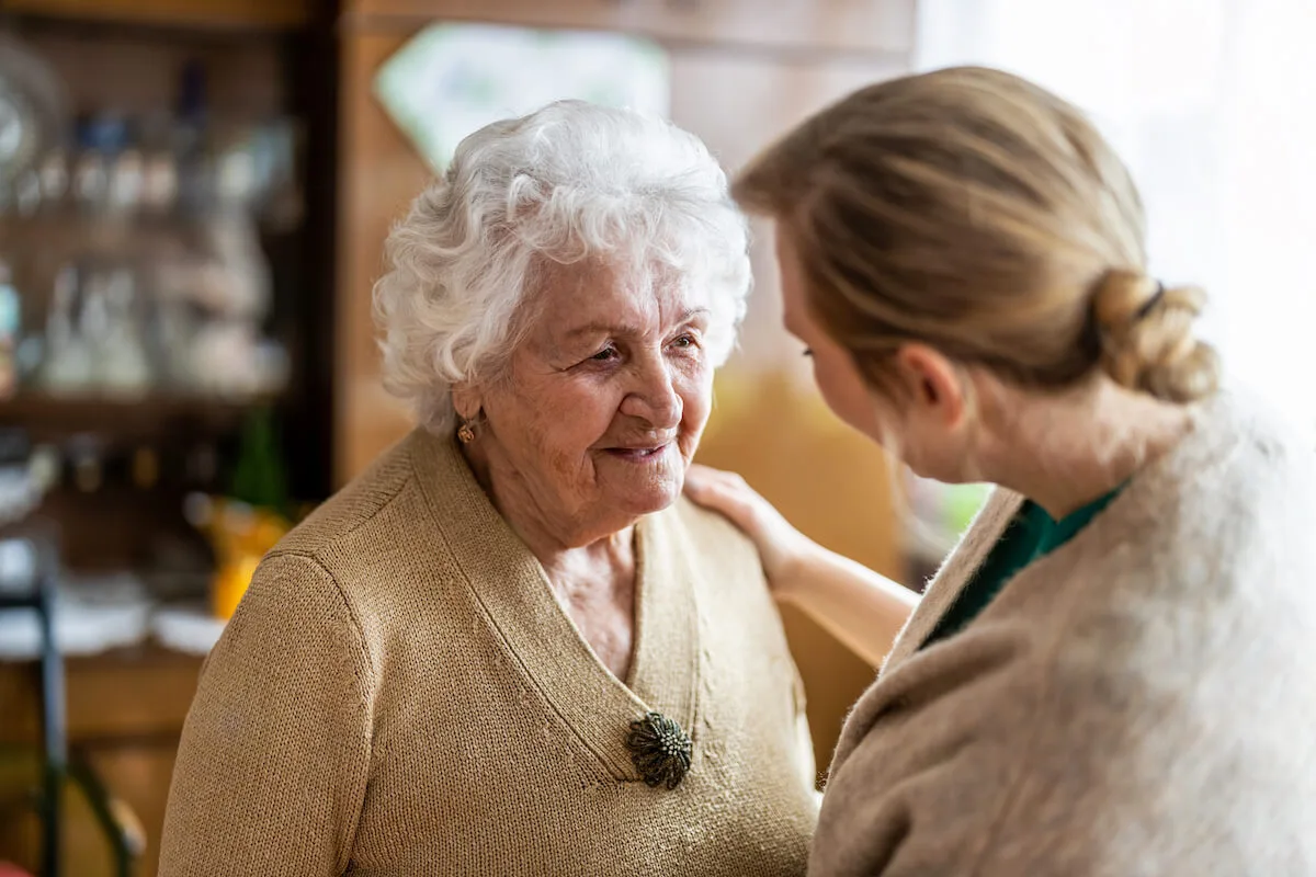 Older woman with caregiver