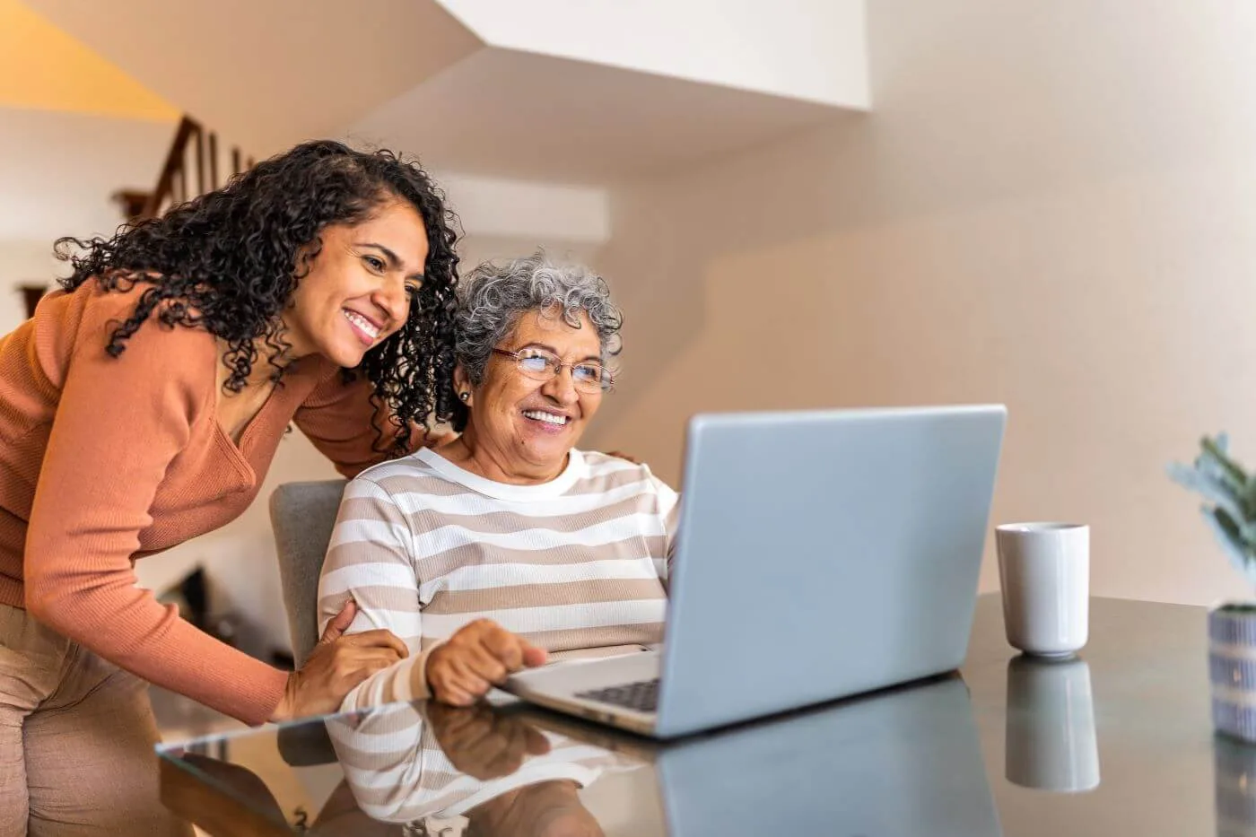 what is the cost of assisted living looking on laptop