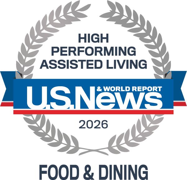 Award badge for U.S. News 2026 High-Performing Assisted Living — Food & Dining, with a laurel wreath and blue ribbon.
