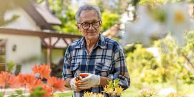 Older man gardening his plants